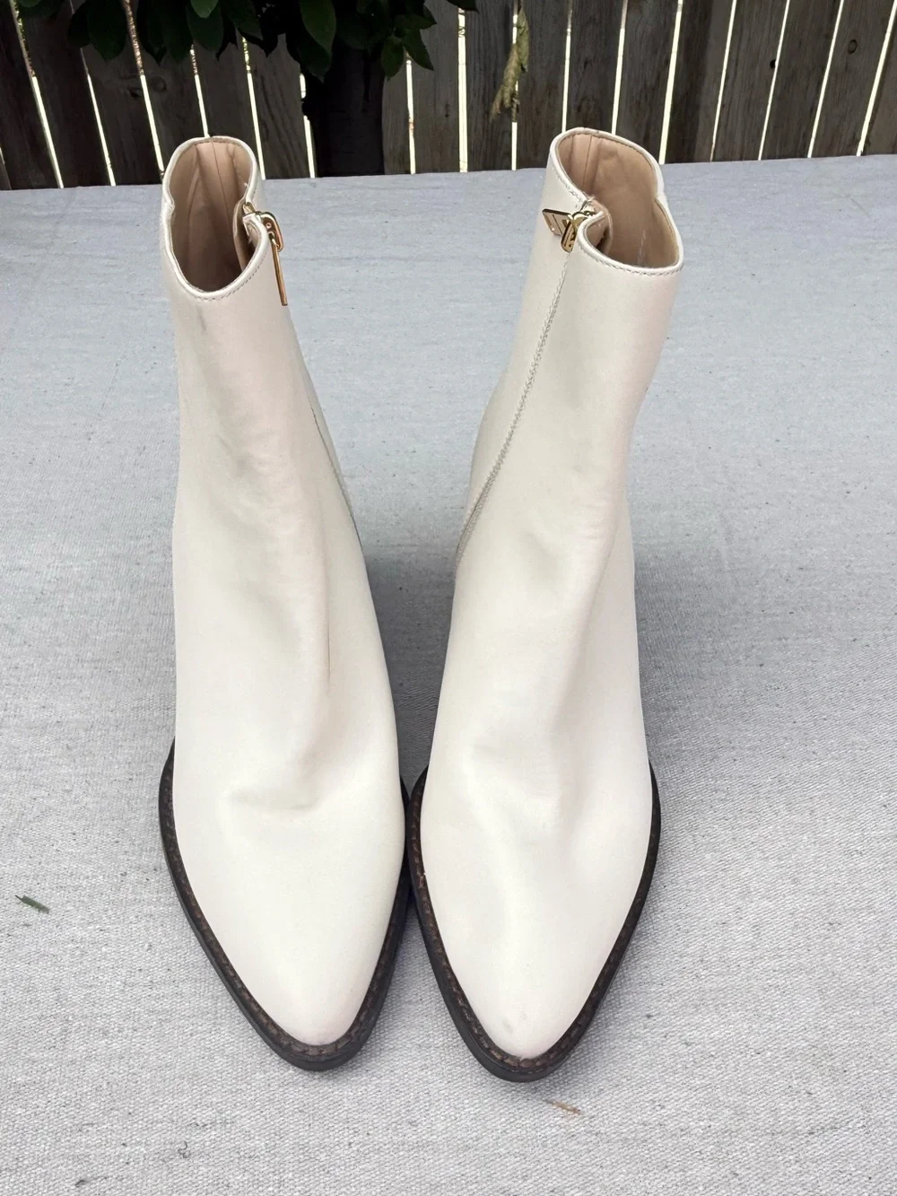 Coach Cream Pointed-Toe Leather Ankle Boots with Gold Zip gold c logo on heel